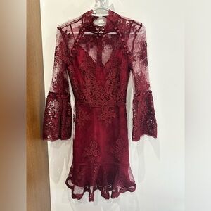 Elegant Nicholas evening dress. Silk underlay and intricate embroidered lace.